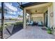 Enjoy the view from this screened patio, furnished with comfortable seating at 13848 Rinuccio St, Venice, FL 34293