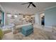 Living room offers an open floor plan and comfortable seating at 13848 Rinuccio St, Venice, FL 34293