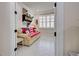 Nautical themed den or office featuring a comfortable sofa, and decorative nautical accents at 13848 Rinuccio St, Venice, FL 34293