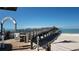 Picturesque view of the Venice Fishing Pier extending into the calm, blue ocean at 147 Tampa E Ave # 202, Venice, FL 34285