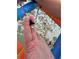 Person finds a shark tooth on the beach with a homemade sifter at 147 Tampa E Ave # 202, Venice, FL 34285