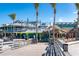 Exterior shot of Sharky's on the Pier restaurant entrance from the pier featuring beach access at 147 Tampa E Ave # 202, Venice, FL 34285