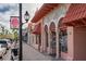 Charming street view of Venice Avenue Creamery, with colorful buildings and awnings, inviting shopping district at 147 Tampa E Ave # 202, Venice, FL 34285
