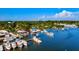 Aerial view of marina with boats and waterfront buildings at 1507 N Knollwood Dr, Bradenton, FL 34208