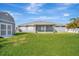 Large backyard with shed and home exterior at 18439 Elgin Ave, Port Charlotte, FL 33948