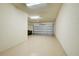 Spacious garage with room for multiple vehicles, offering secure parking and additional storage space at 20190 Ragazza Cir # 202, Venice, FL 34293