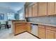 Well-lit kitchen with granite countertops, stainless steel appliances, and lots of cabinet space at 20190 Ragazza Cir # 202, Venice, FL 34293