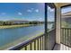 Enjoy the serene waterfront view from this property's lanai, a perfect spot for relaxation and tranquility at 20190 Ragazza Cir # 202, Venice, FL 34293