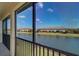 This lanai offers a clear view of the surrounding lake, perfect for relaxation and enjoying the tranquil environment at 20190 Ragazza Cir # 202, Venice, FL 34293