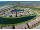 Aerial view of home by lake in resort-style community at 20190 Ragazza Cir # 202, Venice, FL 34293
