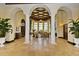 Bright clubhouse lobby with high ceilings and columns at 20391 Lagente Cir, Venice, FL 34293