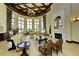 Spacious clubhouse lounge with fireplace and seating area at 20391 Lagente Cir, Venice, FL 34293