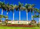 Grand Paradiso community entrance with palm trees at 20391 Lagente Cir, Venice, FL 34293