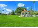 Relaxing park with lush green grass and a charming gazebo at 20391 Lagente Cir, Venice, FL 34293