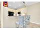 Kitchen features a breakfast bar with light cabinets at 20391 Lagente Cir, Venice, FL 34293
