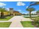 Community pool with walkway, landscaping and clubhouse at 20391 Lagente Cir, Venice, FL 34293