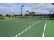 Well-maintained tennis court with ample space at 20391 Lagente Cir, Venice, FL 34293
