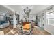 Open concept dining room, looking toward the kitchen and living room at 3358 Yukon Dr, Port Charlotte, FL 33948