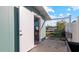 Workshop with open door, showing tools and storage at 3358 Yukon Dr, Port Charlotte, FL 33948