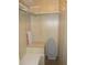 Organized closet with shelves and hanging rods, providing ample storage for clothing and accessories at 359 Longwood Dr, Venice, FL 34285