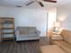 Comfortable living room featuring cozy seating, neutral colors, and natural light, perfect for relaxing at 359 Longwood Dr, Venice, FL 34285
