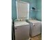 Laundry room with Whirlpool washer and dryer at 4213 Vicenza Dr # D2, Venice, FL 34293