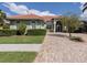 Exterior view of a single-Gathering home with well-manicured landscaping at 4245 Via Del Villetti Dr, Venice, FL 34293
