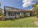 Home exterior with screened enclosure at 4245 Via Del Villetti Dr, Venice, FL 34293