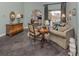 Living room boasts a neutral color palette and plenty of natural light at 4245 Via Del Villetti Dr, Venice, FL 34293