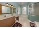 Spa-like bathroom with soaking tub and walk-in shower at 4245 Via Del Villetti Dr, Venice, FL 34293