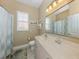 Guest bathroom with shower/tub combo and vanity at 4245 Via Del Villetti Dr, Venice, FL 34293