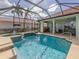 Screened pool and spa with lake view at 4245 Via Del Villetti Dr, Venice, FL 34293