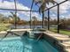 Screened pool with spa and water feature at 4245 Via Del Villetti Dr, Venice, FL 34293