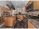 Modern kitchen with island, granite countertops and stainless steel appliances at 4245 Via Del Villetti Dr, Venice, FL 34293