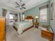 Main bedroom with private access to the pool area at 4245 Via Del Villetti Dr, Venice, FL 34293