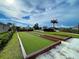 Enjoy a friendly game of bocce ball on this well-maintained community court at 569 Mistiflower Cir, Nokomis, FL 34275