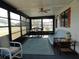 Screened lanai offering an additional seating area with outdoor views at 6234 Parakeet Rd, Englewood, FL 34224