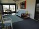 Inviting porch with furniture, windows, and relaxing atmosphere at 6234 Parakeet Rd, Englewood, FL 34224