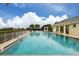 Large community pool with lounge chairs at 648 Lakescene Dr, Venice, FL 34293