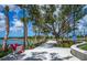 Lakefront walkway with benches and landscaping at 649 Crossfield Cir # 10, Venice, FL 34293