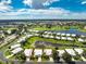 Aerial view of community, highlighting home's location near water at 649 Crossfield Cir # 10, Venice, FL 34293