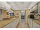 Kitchen boasts granite countertops and ample cabinet space at 1402 Grand Blvd # 240, Sarasota, FL 34232