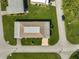 Top-down view of single-story home, lawn, and street at 1402 Grand Blvd # 240, Sarasota, FL 34232