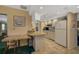 Modern kitchen with granite counters and stainless steel appliances at 1402 Grand Blvd # 240, Sarasota, FL 34232