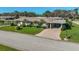 Single-story home with carport, well-manicured lawn and landscaping at 1402 Grand Blvd # 240, Sarasota, FL 34232
