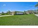 Single story home with a well manicured lawn at 1402 Grand Blvd # 240, Sarasota, FL 34232