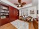 Guest room with a Murphy bed and wicker chairs at 147 Tampa E Ave # 202, Venice, FL 34285