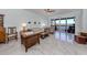 Living room with water views, comfortable seating and hardwood floors at 147 Tampa E Ave # 202, Venice, FL 34285
