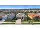 Community overview showcasing numerous homes and landscaping at 11925 Bohemian Pl, Venice, FL 34293