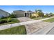 One-story home with attractive landscaping and driveway at 11925 Bohemian Pl, Venice, FL 34293